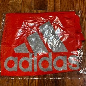 New Adidas shirt with tags never worn